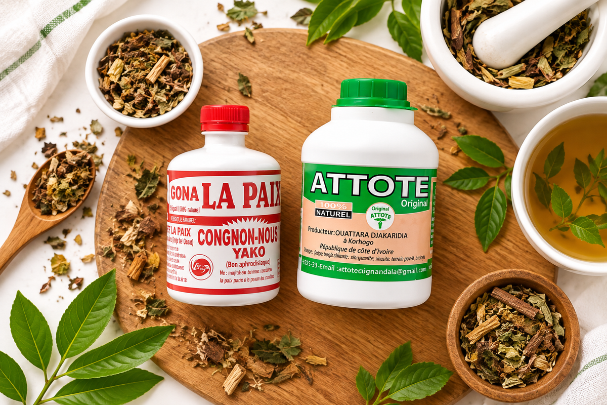 La Paix and Attote herbal bottles on a natural wooden surface with dried herbs